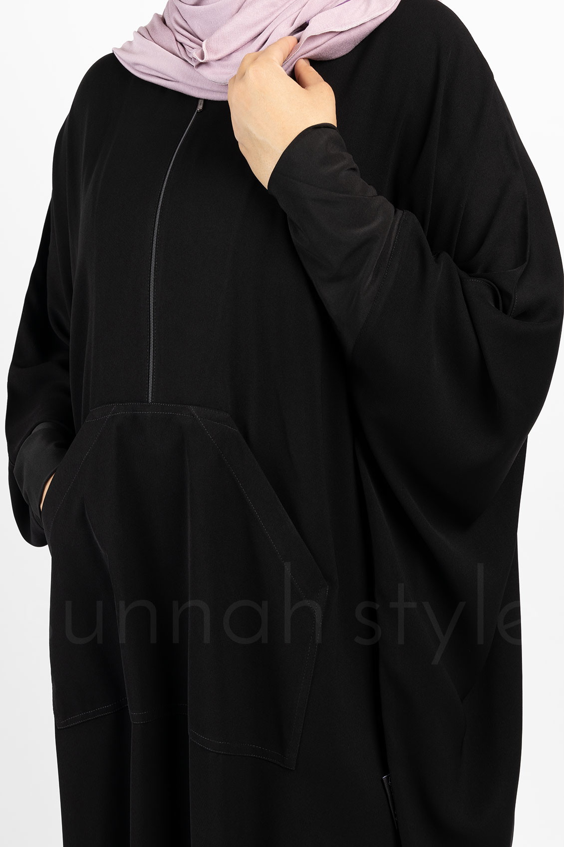 Comfortable and functional, unlined beige abaya with snaps on the